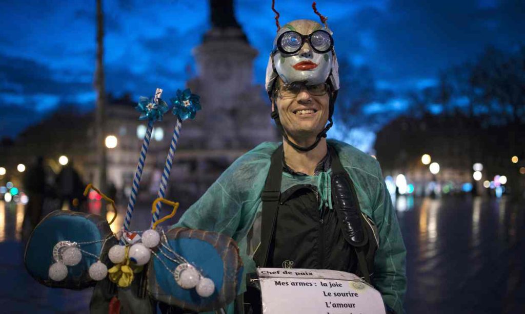 Michel, an artist who hopes to be a candidate in the 2017 French presidential elections, joins the protesters in Paris. Photograph: Elliott Verdier/AFP/Getty Images