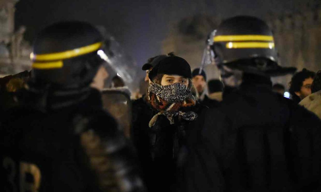 Protesters confront riot police in Paris. Photograph: Dominique Faget/AFP/Getty Images